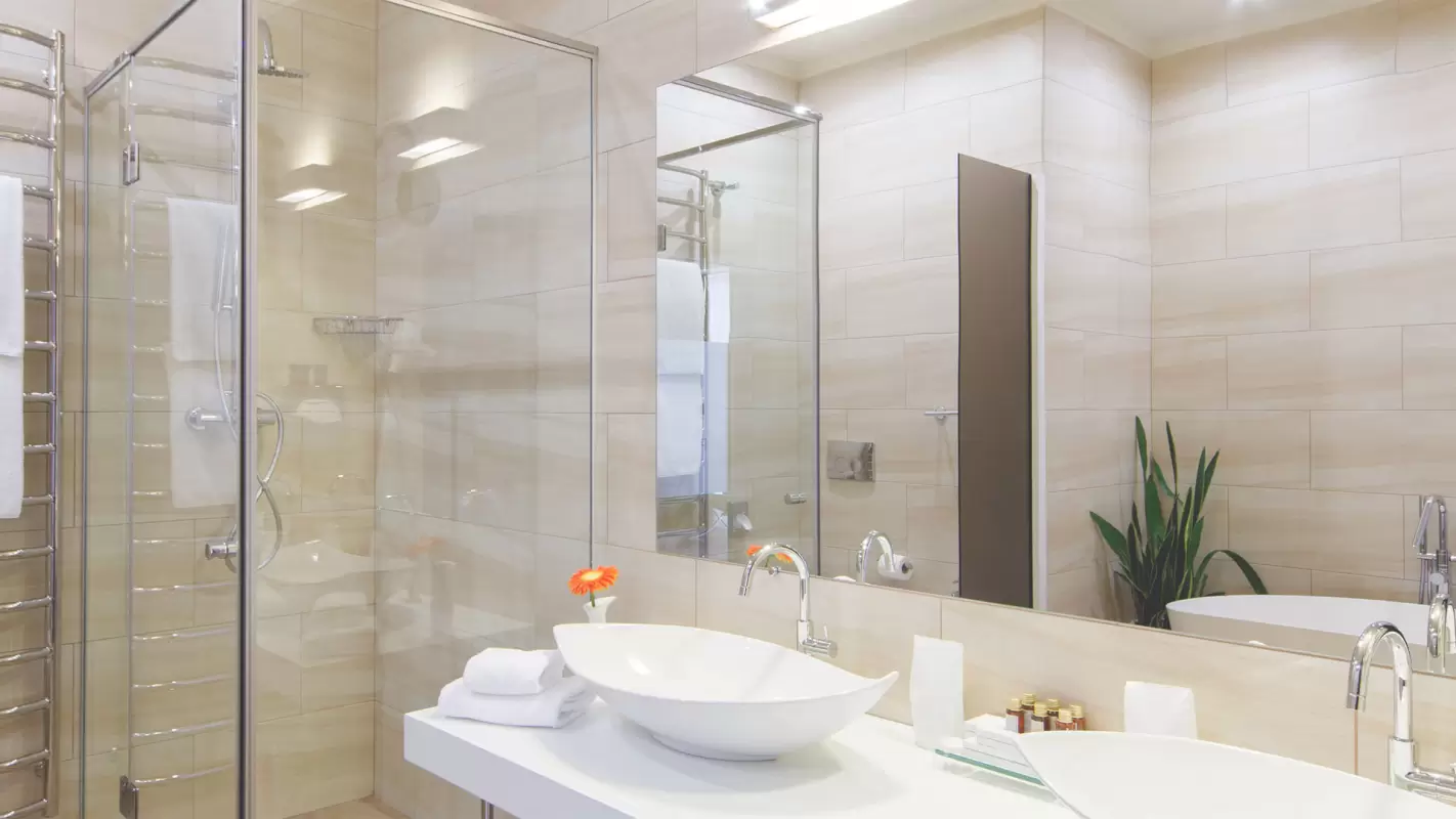 Finished bathroom remodel with glass shower and vanity
